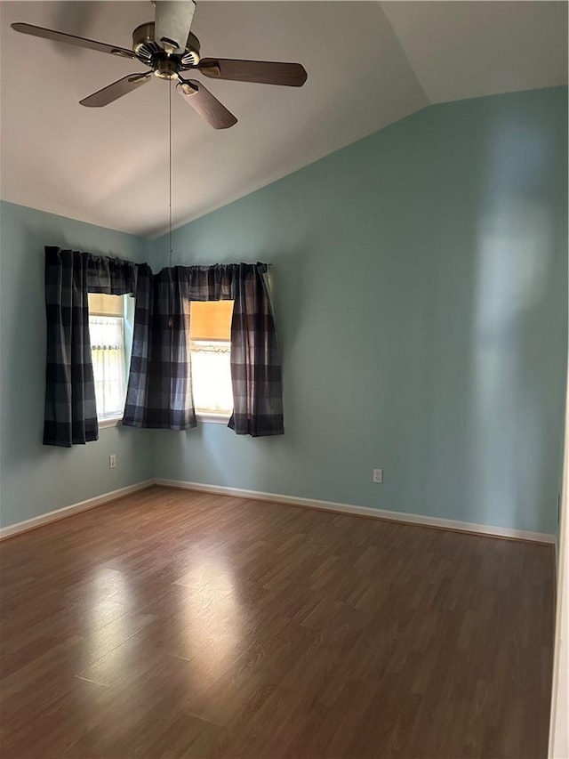 unfurnished room with hardwood / wood-style floors, ceiling fan, and lofted ceiling