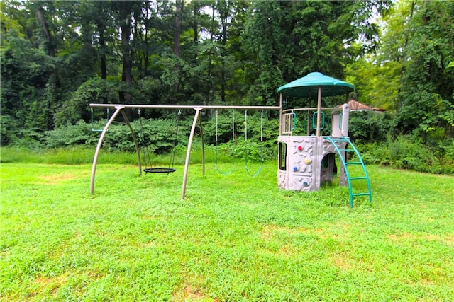 view of playground with a yard