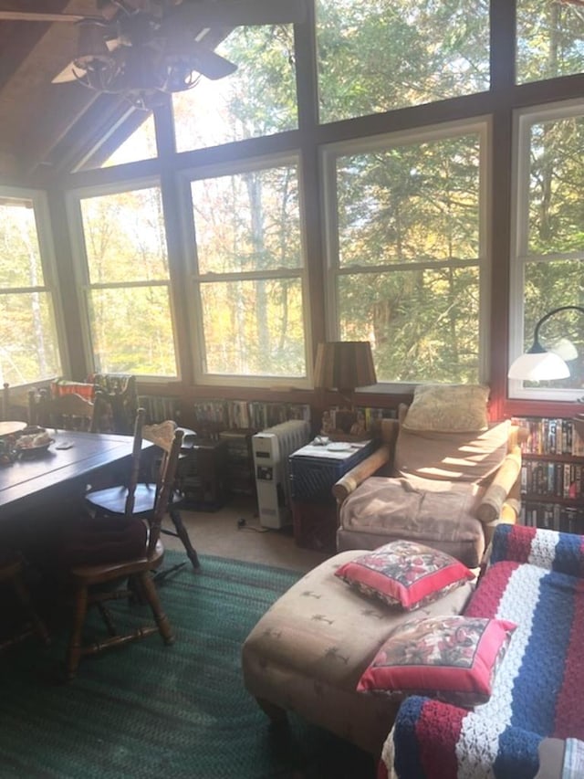 sunroom / solarium with ceiling fan