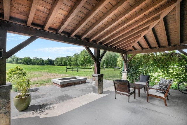 view of patio / terrace with an outdoor fire pit