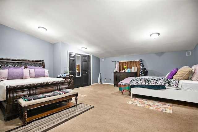 carpeted bedroom featuring vaulted ceiling