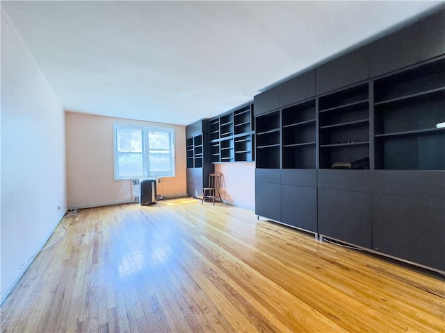 unfurnished living room featuring light hardwood / wood-style floors