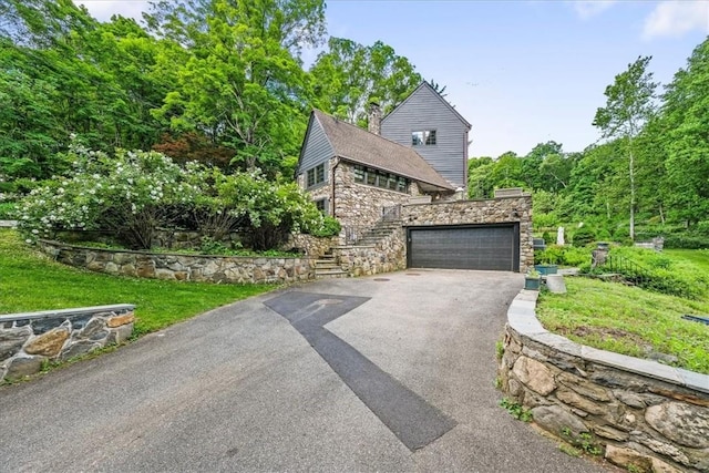 view of property exterior featuring a garage