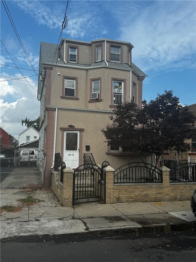 view of front facade featuring cooling unit