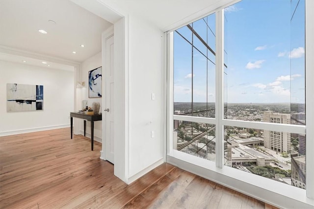 1 Renaissance Sq Unit Ph2Bc, White Plains, NY 10601 - interior space featuring expansive windows, healthy amount of natural light, wood finished floors, baseboards, and recessed lighting