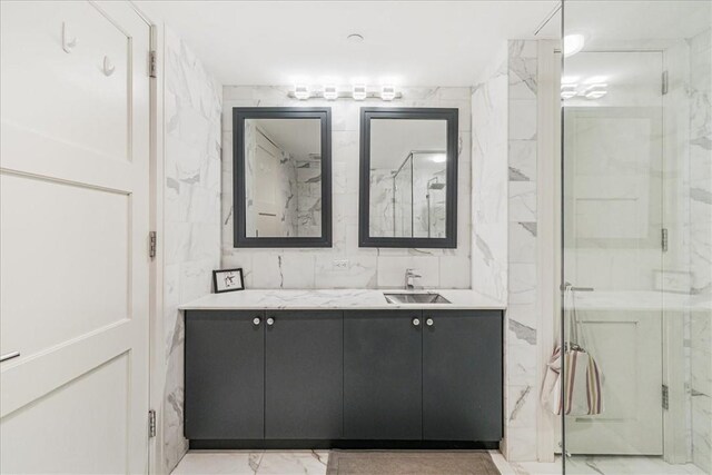 1 Renaissance Sq Unit Ph2Bc, White Plains, NY 10601 - full bathroom with marble finish floors, vanity, a marble finish shower, and tile walls