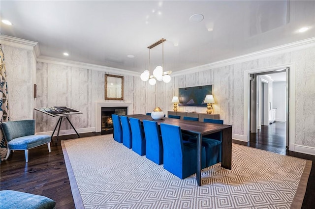 interior space with dark hardwood / wood-style floors and ornamental molding