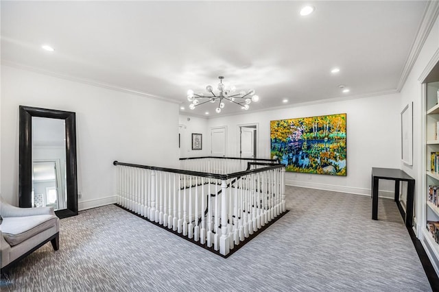 hall with crown molding, carpet floors, and a chandelier