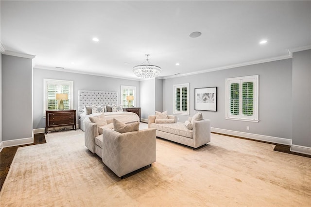 bedroom featuring a chandelier, hardwood / wood-style floors, and ornamental molding