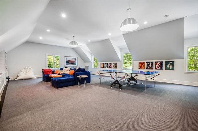 playroom with plenty of natural light, carpet floors, and vaulted ceiling