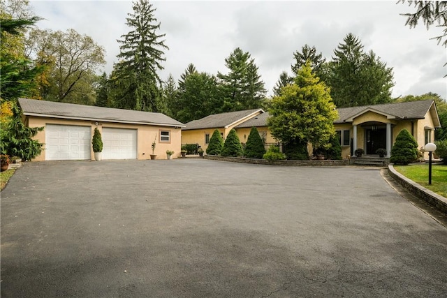 single story home featuring a garage