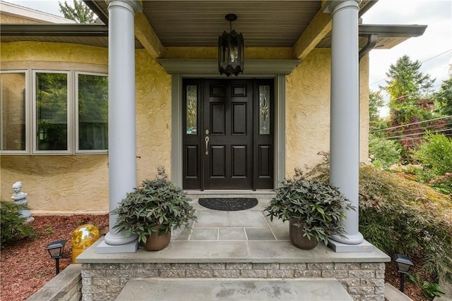 property entrance with a porch