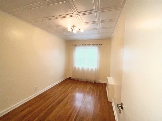 empty room with wood-type flooring