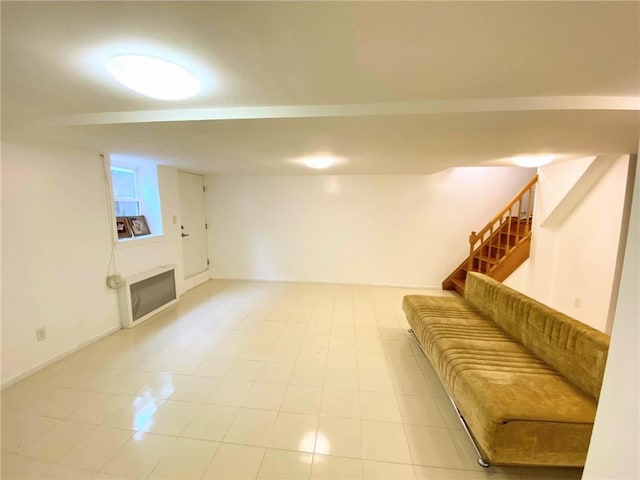 living room featuring light tile patterned flooring