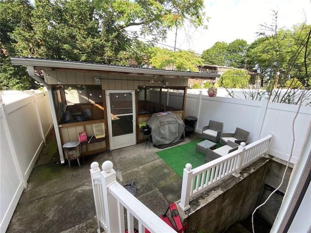 view of patio featuring a grill