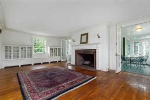 living room featuring a fireplace and dark hardwood / wood-style flooring