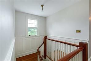 staircase featuring hardwood / wood-style flooring