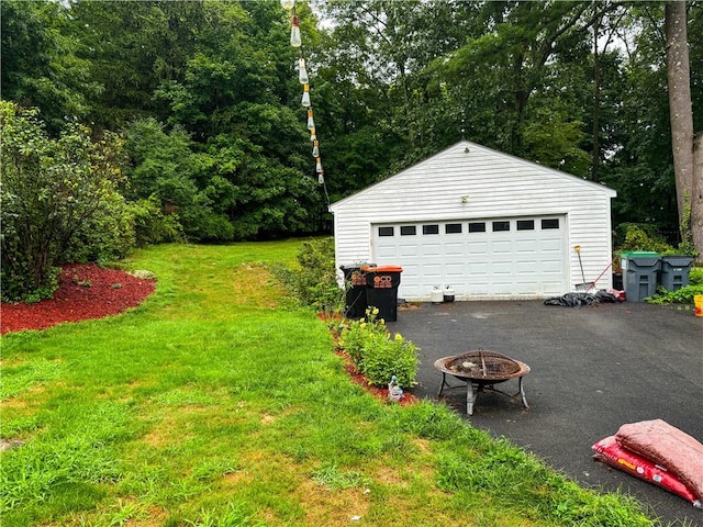 garage with a yard