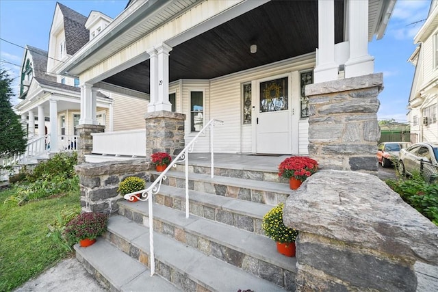 property entrance with a porch