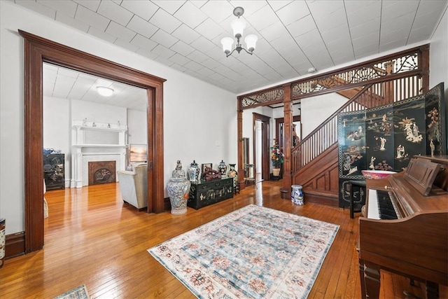 interior space featuring a notable chandelier and hardwood / wood-style flooring