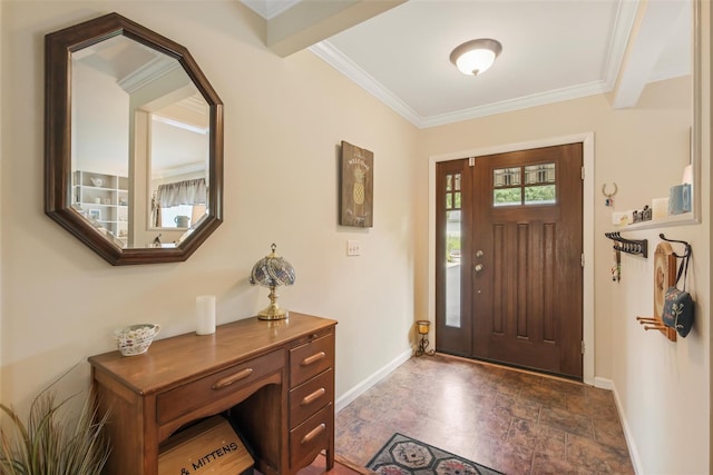 foyer featuring baseboards, stone finish flooring, and crown molding