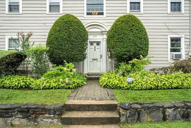 entrance to property with cooling unit