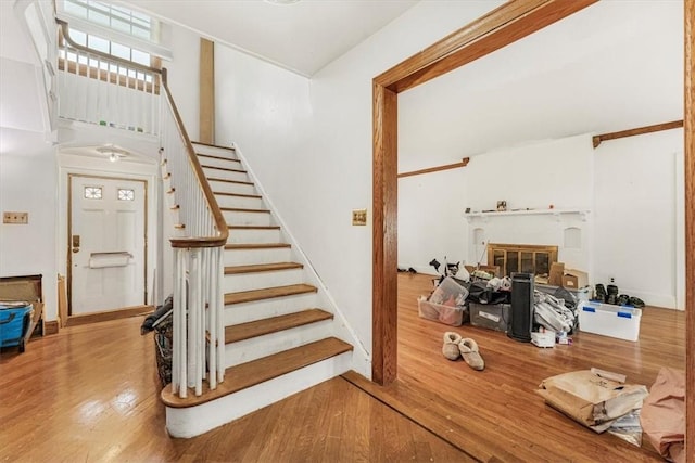 stairway featuring hardwood / wood-style flooring