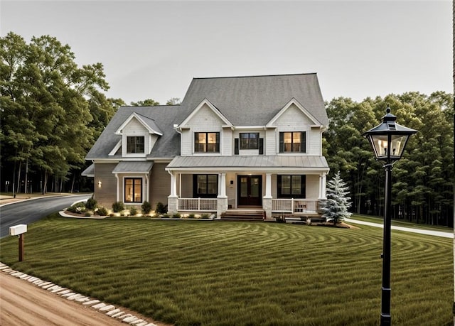 view of front facade featuring a porch and a front lawn