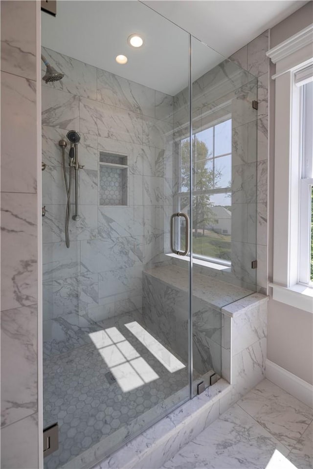 bathroom with an enclosed shower