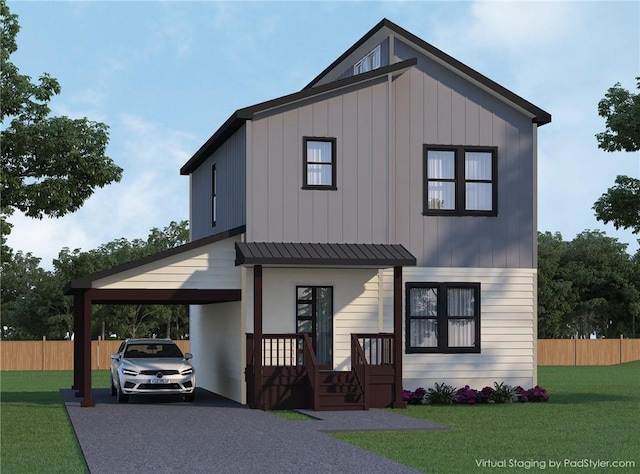 view of front of house featuring a carport and a front yard