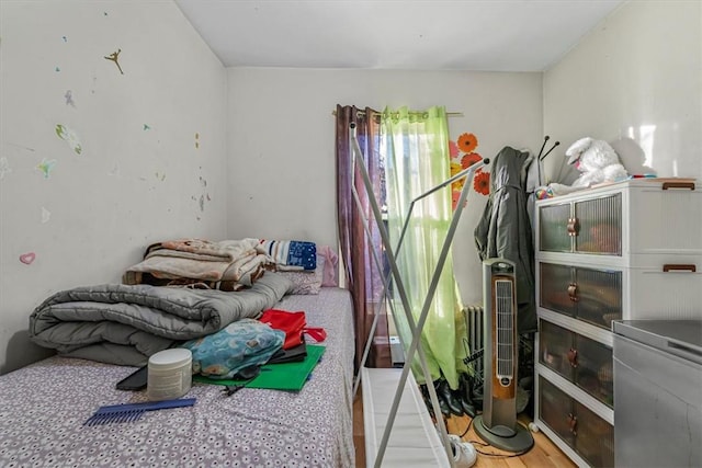 bedroom featuring light hardwood / wood-style floors