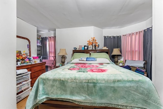 bedroom featuring hardwood / wood-style flooring