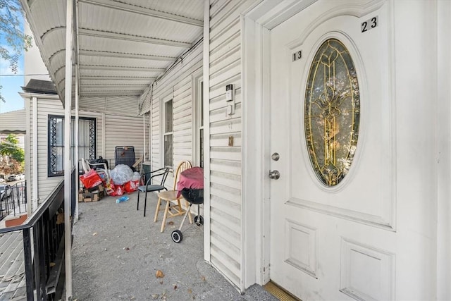 property entrance with a porch