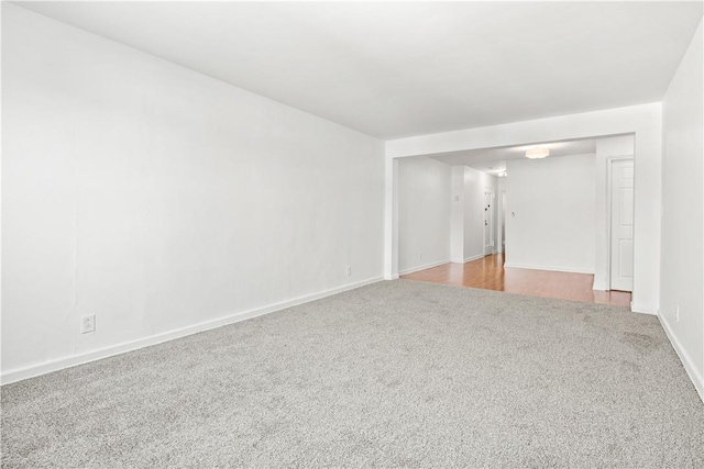 empty room with light colored carpet