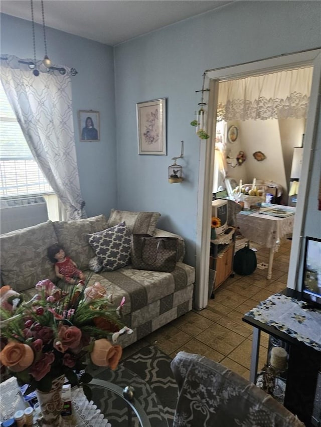 living room with light tile patterned floors