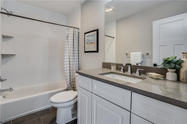 full bathroom featuring tile patterned flooring, vanity, toilet, and shower / bathtub combination with curtain