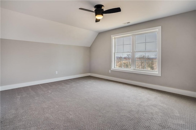 bonus room with carpet floors, ceiling fan, and lofted ceiling