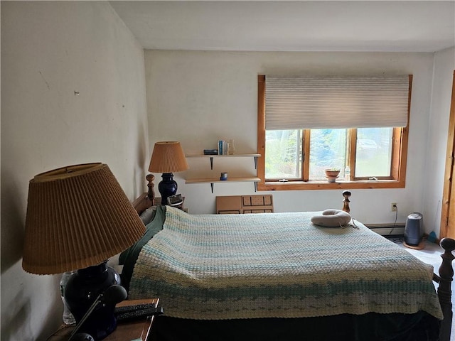 bedroom featuring a baseboard radiator