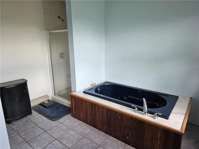 bathroom with tile patterned flooring and independent shower and bath