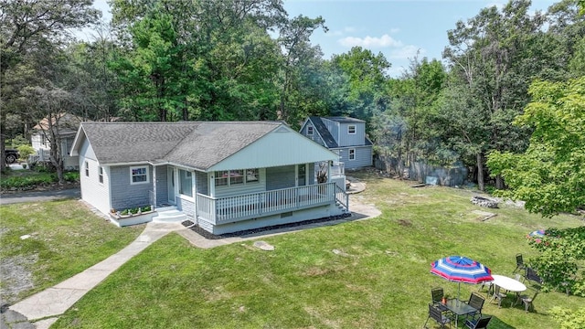 exterior space with a yard and a porch