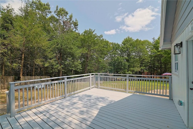 deck featuring a lawn