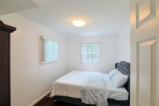 bedroom featuring hardwood / wood-style floors