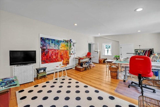 office space with wood-type flooring