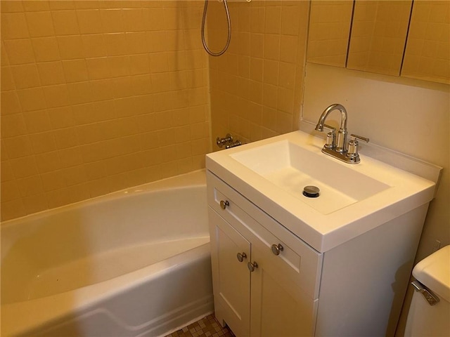 full bathroom featuring tile patterned flooring, tiled shower / bath combo, toilet, and sink