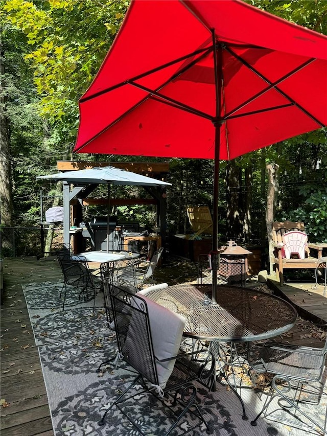 view of patio / terrace featuring a wooden deck