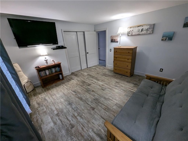 unfurnished living room featuring wood-type flooring