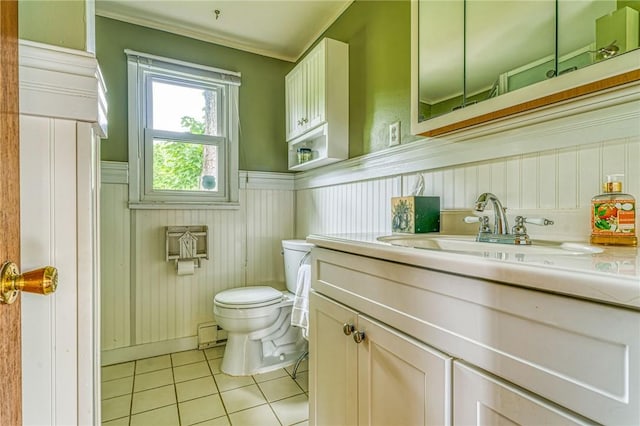 bathroom with tile patterned flooring, vanity, a baseboard radiator, and toilet