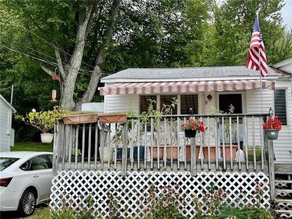 view of gate with covered porch