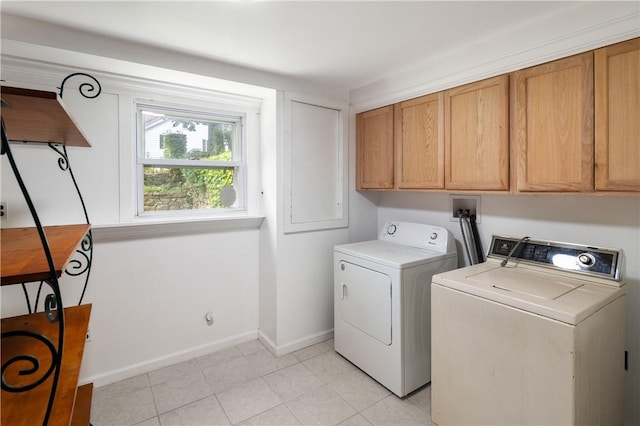 laundry area featuring cabinets and independent washer and dryer