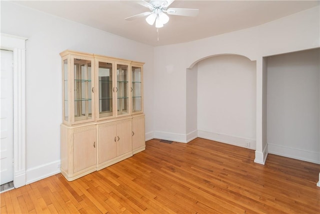 unfurnished dining area featuring hardwood / wood-style floors and ceiling fan